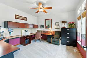 Office featuring light carpet and ceiling fan