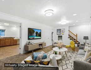 Lower level family room with brand new neutral paint, and opens to wet bar or craft room