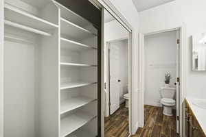 Primary bath with double vanity and closet