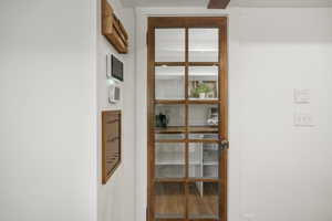 Walk in pantry with a classic vintage door.