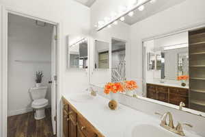 Primary bath with double vanity and closet