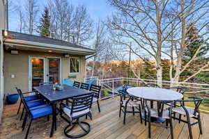 Wooden terrace with outdoor dining space