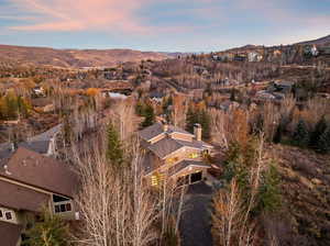 Aerial view of residential area featuring mountains