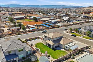 Aerial perspective of suburban area featuring mountains