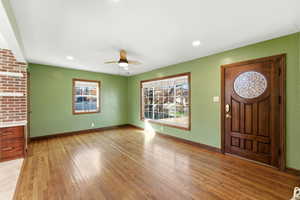 Entrance foyer featuring ceiling fan, light wood-style floors, and recessed lighting