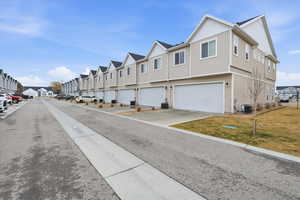 View of asphalt road with a residential view