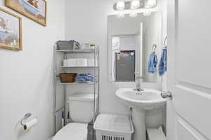 Half bathroom featuring toilet