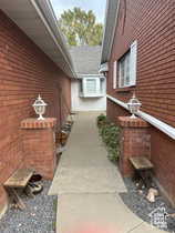 View of side of home featuring brick siding