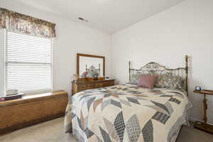 View of carpeted bedroom