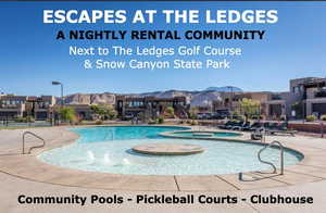 Community pool featuring a jacuzzi, a patio, and a mountain view