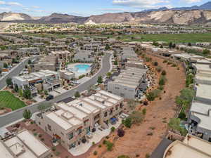 Aerial view of residential area featuring a mountain backdrop