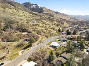 Aerial view of residential area with a mountainous background