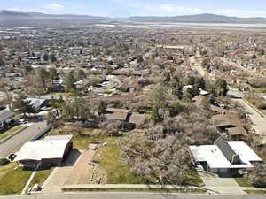 View of property location featuring a mountainous background and nearby suburban area