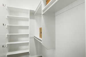 View of master bedroom walk in closet