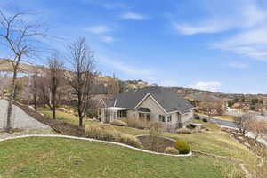 View of back of house and backyard