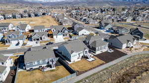 Aerial view of residential area with a mountain backdrop