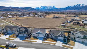 Aerial view of residential area with a mountainous background