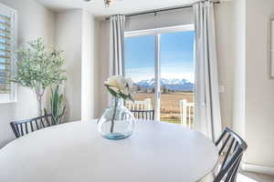 Dining area featuring a mountain view