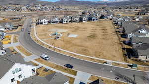 Aerial perspective of suburban area with a mountain backdrop