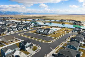 Aerial perspective of suburban area with a large body of water