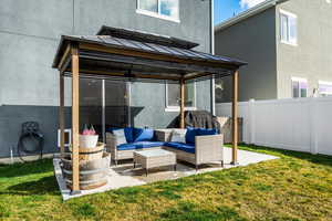 View of patio / terrace featuring a gazebo and outdoor seating