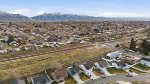Aerial view of residential area featuring mountains