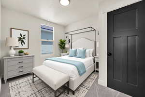 Bedroom with light carpet