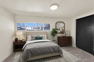 Bedroom with carpet flooring and baseboards