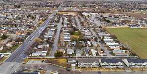 Aerial overview of property's location with nearby suburban area
