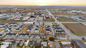 Aerial view of property's location featuring nearby suburban area