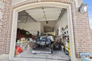 Extra length gargage for a fourth car