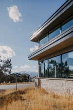 View of property exterior featuring a mountain view