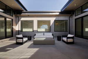 View of patio featuring an outdoor lounge area