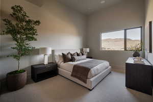 Bedroom with light carpet and baseboards