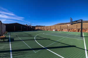 View of sport court with community basketball court and a mountain view