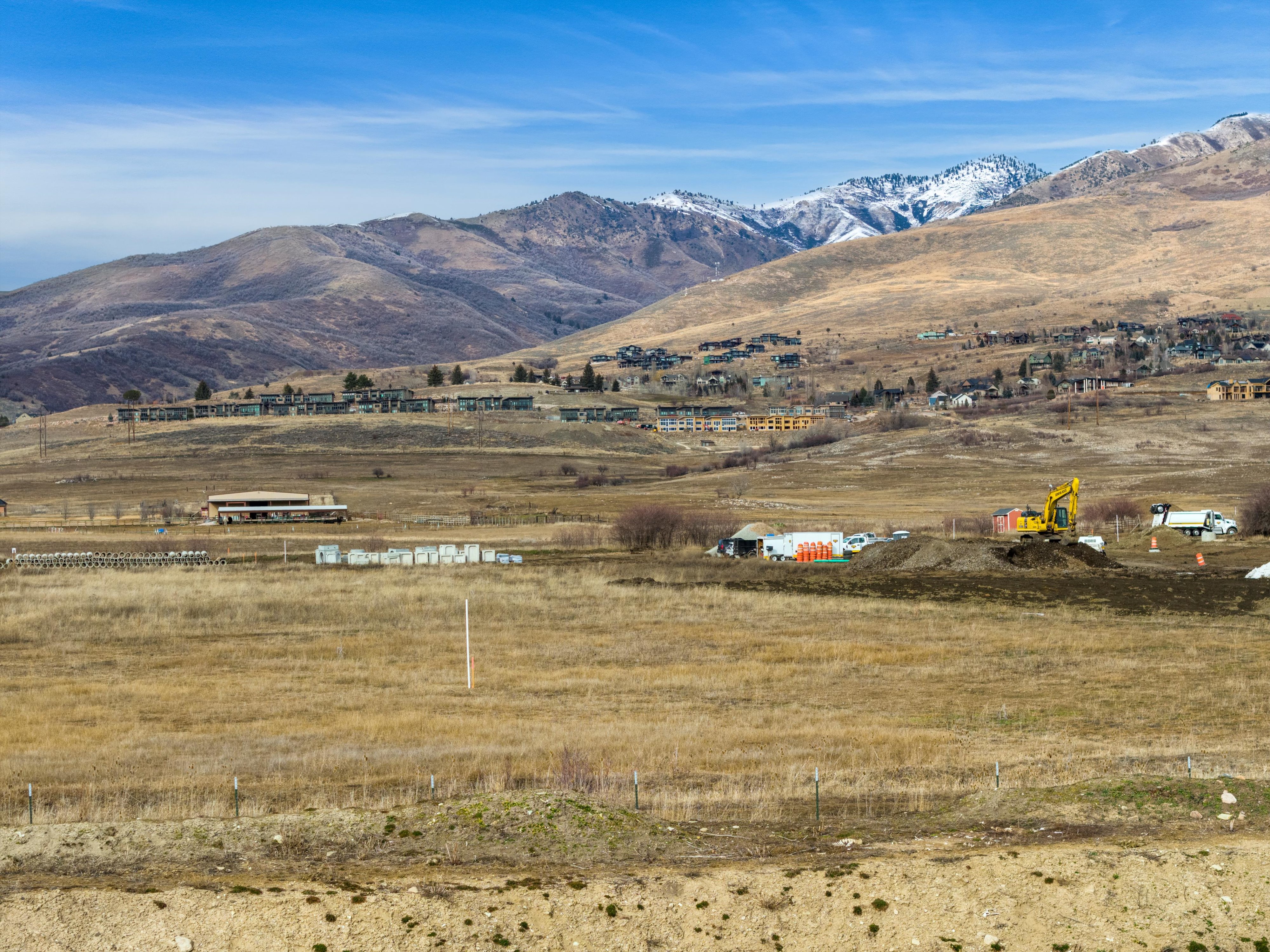 View of mountain backdrop featuring rural landscape