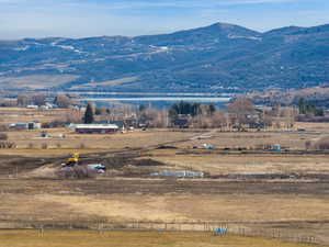 View of mountain background with a nearby body of water