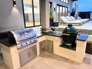 View of patio with an outdoor kitchen