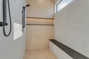 Full bath with tiled shower