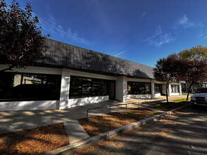 View of front of house with a metal roof