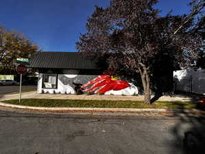 View of front facade with a metal roof