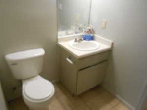 Bathroom with vanity and light tile patterned flooring