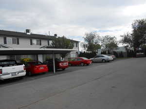 Covered parking lot with a residential view