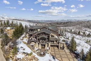 Snowy aerial view with a mountain view
