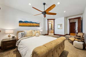 Bedroom with carpet floors, recessed lighting, and a ceiling fan