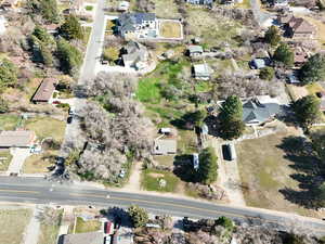 Aerial overview of property's location with nearby suburban area