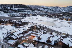 Snowy aerial view with a mountain view