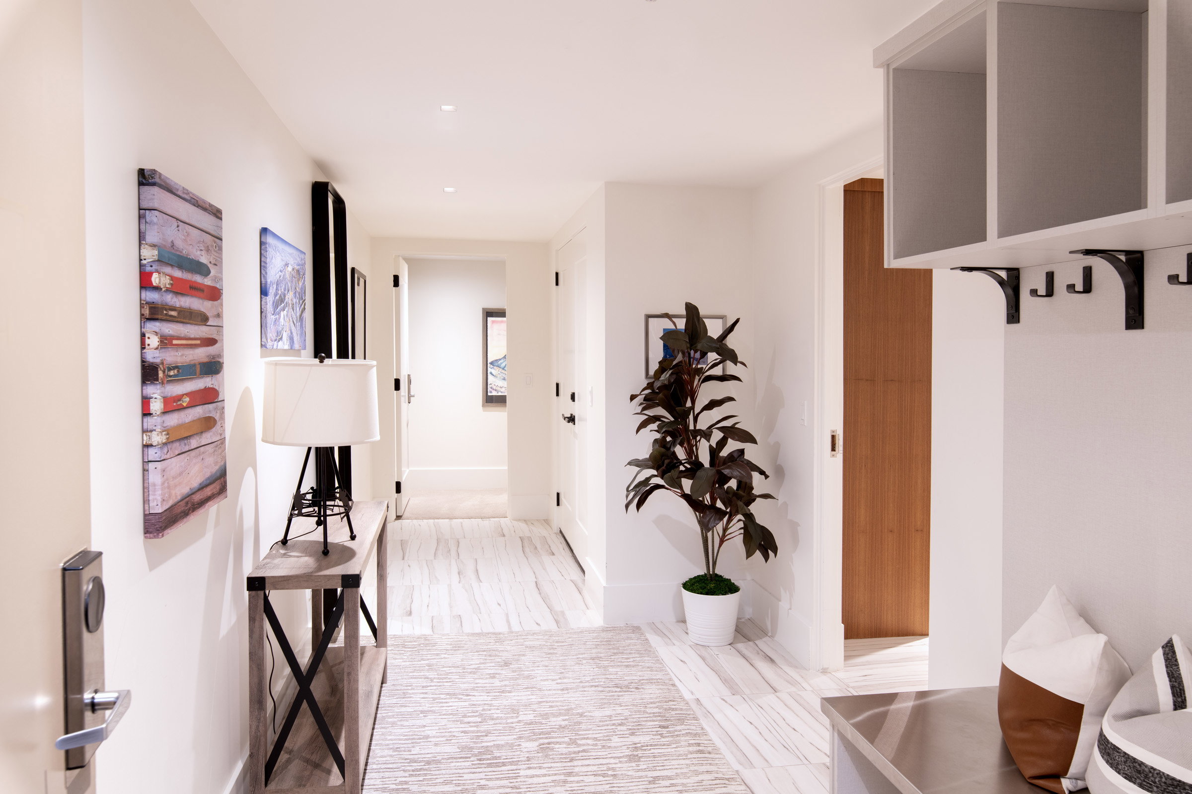 Hallway with baseboards and recessed lighting