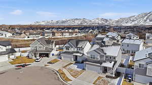 Aerial view of residential area with a mountainous background