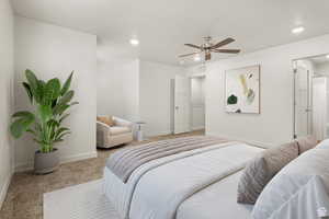 Bedroom with light carpet, recessed lighting, and ceiling fan